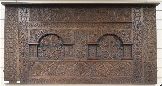 A carved oak wall panel, W.157cm
